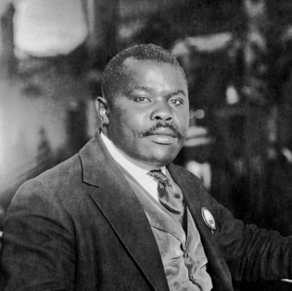 Image is a black and white photo of Marcus Mosiah Garvey Jr. ONH a Jamaican political activist.  