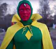Vision in a green suit and yellow cape