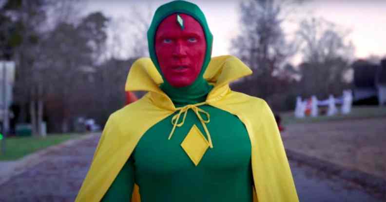 Vision in a green suit and yellow cape