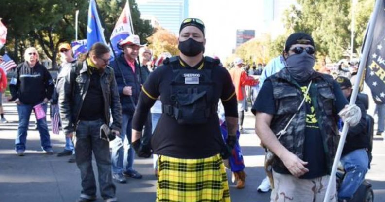 A man identified by social media sleuths as police officer Rick Fitzgerald attending a Proud Boys event