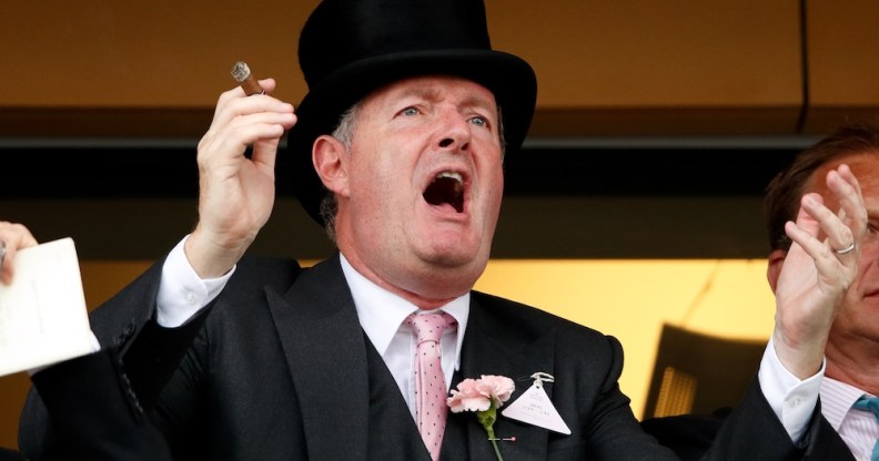 Piers Morgan smokes a cigar whilst watching the racing on day two of Royal Ascot at Ascot Racecourse on June 19, 2019 in Ascot, England