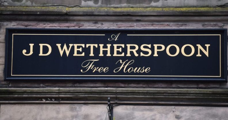 A close up of a Wetherspoons pub sign