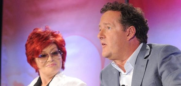 Sharon Osbourne and Piers Morgan talk on a panel