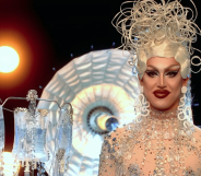 A'Whora, a drag queen, in a silver medusa-like headpiece and see-through jewelled dress