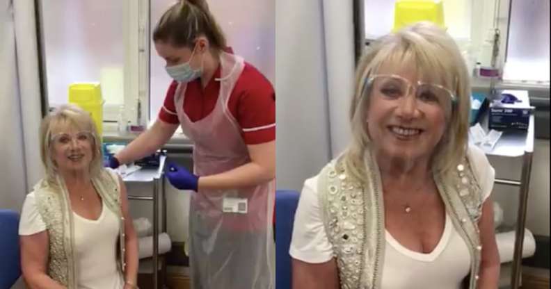 Elaine Paige, with a screen visor, receives her second coronavirus vaccine dose