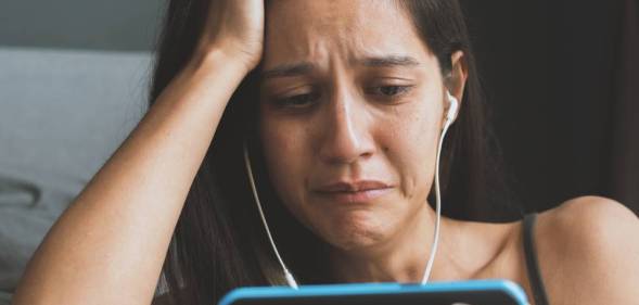 young woman online sad