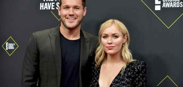 Colton Underwood (L) and Cassie Randolph pose together on the red carpet