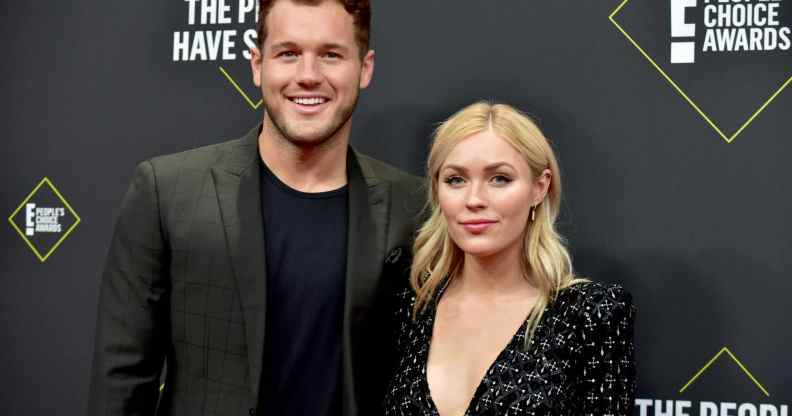 Colton Underwood (L) and Cassie Randolph pose together on the red carpet