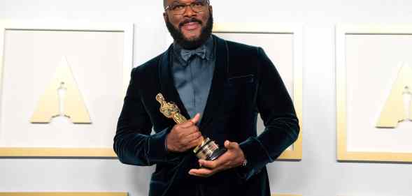 Tyler Perry, winner of the Jean Hersholt Humanitarian Award, poses in the press room