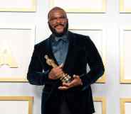 Tyler Perry, winner of the Jean Hersholt Humanitarian Award, poses in the press room