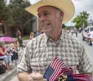 Greg Gianforte Montana parade american flags