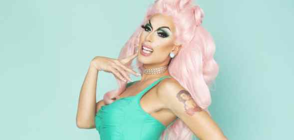 Alaska, a drag queen in pink hair and a green dress