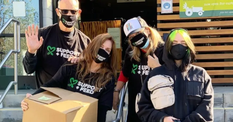 Billie Eilish and her parents, Patrick O’Connell and Maggie Baird, wearing Support + Feed tees