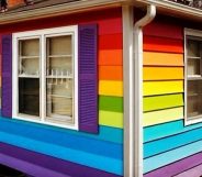 House opposite Westboro Baptist Church painted in Pride flag colours