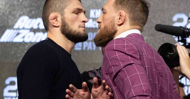 Retired UFC lightweight champion Khabib Nurmagomedov (L) and Conor McGregor (R) face off after the UFC 229 press conference