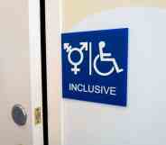 Sign for inclusive restroom, with symbol indicating male, female and transgender as well as handicapped symbol, part of LGBT rights initiatives in the Mission District neighborhood of San Francisco