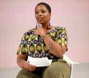 Patrisse Cullors speaks on stage at the Teen Vogue Summit