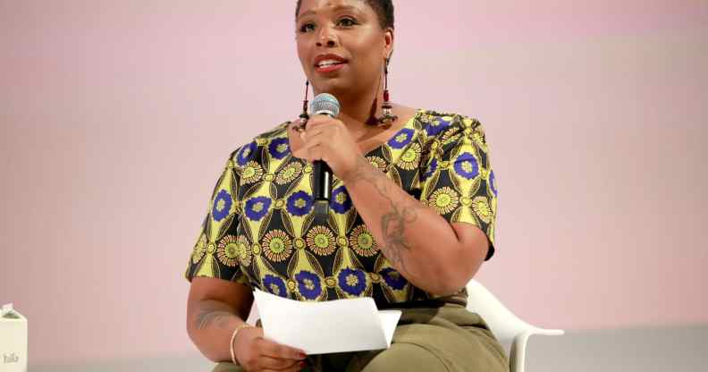 Patrisse Cullors speaks on stage at the Teen Vogue Summit