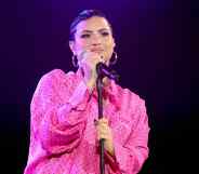 Demi Lovato performs onstage during the OBB Premiere Event in a pink dress