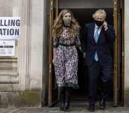 Prime minister Boris Johnson and his fiancée Carrie Symonds leave Methodist Central Hall in Westminster