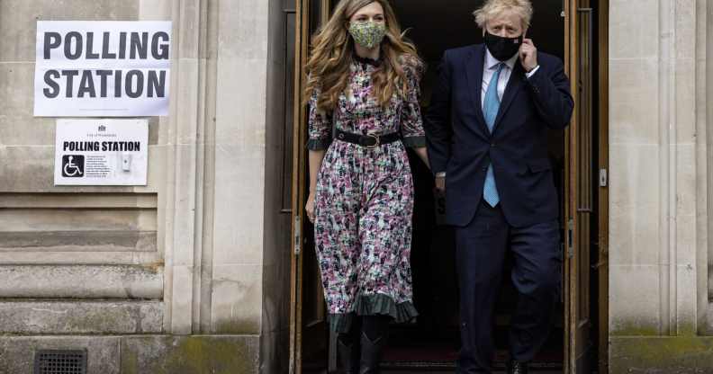 Prime minister Boris Johnson and his fiancée Carrie Symonds leave Methodist Central Hall in Westminster