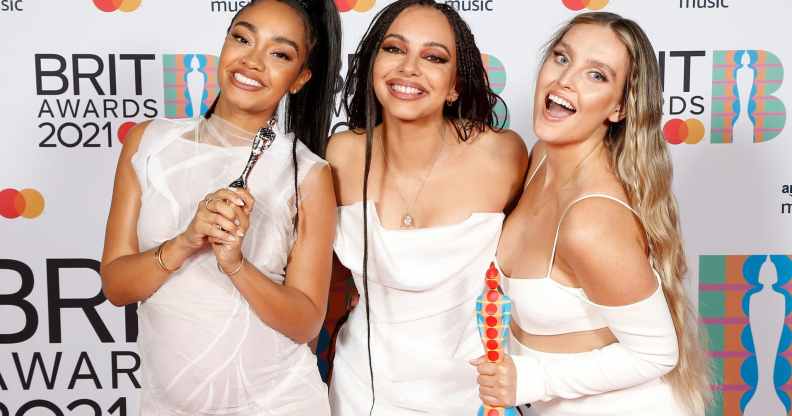 Leigh-Anne Pinnock, Jade Thirlwall and Perrie Edwards pose with their British Group award in the media room during The BRIT Awards 2021