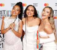 Leigh-Anne Pinnock, Jade Thirlwall and Perrie Edwards pose with their British Group award in the media room during The BRIT Awards 2021