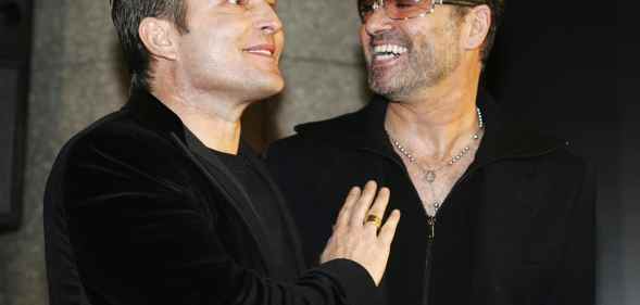 The late George Michael and his partner Kenny Goss a