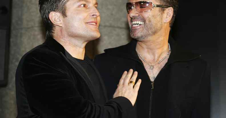 The late George Michael and his partner Kenny Goss a
