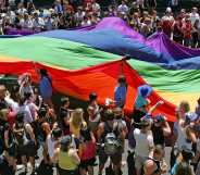 The Rainbow flag, a symbol of gay pride is paraded down Fitzroy Street