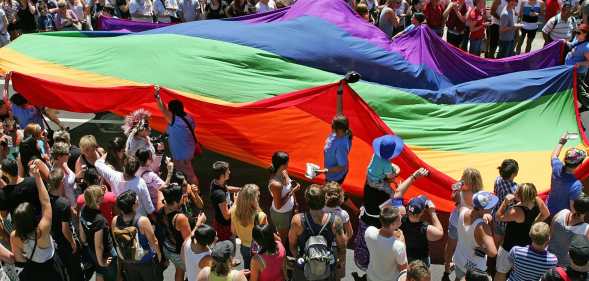 The Rainbow flag, a symbol of gay pride is paraded down Fitzroy Street