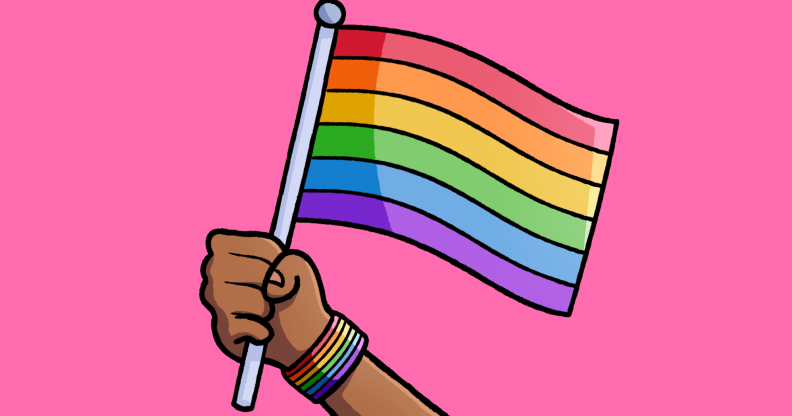 Illustrated rainbow pride flag being held by someone wearing a rainbow pride bracelet.