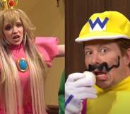 On the left: Grimes dressed as Princess Peach waving her hands in the air. On the right: Elon Musk, dressed as Wario, snickers while holding his fake moustache.