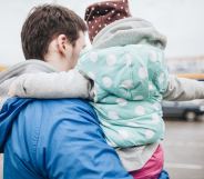 Father holding child