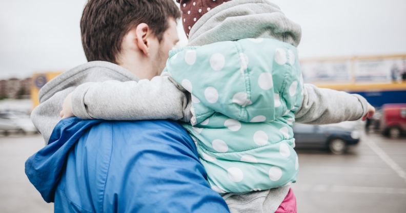 Father holding child