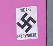 swastika sticker on door of Mad Myrna's gay bar