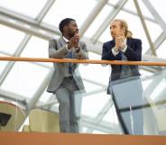 two men at work talking