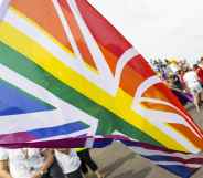 A rainbow Union Jack during Brighton Pride Parade