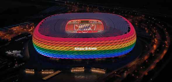 The Allianz Arena football stadium illuminated in rainbow colours