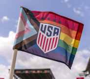 A corner flag with the Pride flag printed on it sits on the field during a training session at BBVA Stadium on June 9, 2021 in Houston, Texas