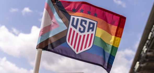 A corner flag with the Pride flag printed on it sits on the field during a training session at BBVA Stadium on June 9, 2021 in Houston, Texas