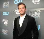 Armie Hammer in a black blazer with a shawl lapel