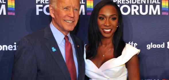 Joe Biden and Angelica Ross smiling for cameras