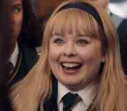 Nicola Coughlan as Derry Girls' Clare, in school uniform and headband