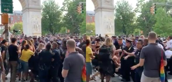 With the arch visible, police pack the streets outside Washington Square Park