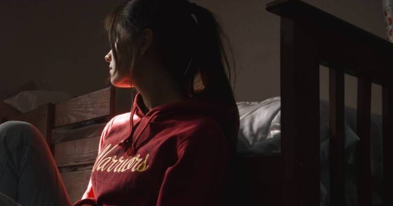 LGBT person alone sad