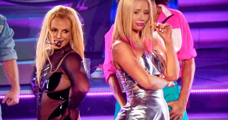 Britney Spears (L) and Iggy Azalea perform via video during the 2015 Billboard Music Award