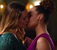 Joy and Zoey share a kiss in the series finale of Hallmark's Good Witch