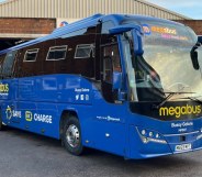 A blue bus with the words 'Bussy Galore' on the front
