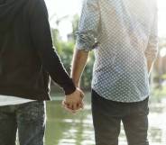 same-sex couple holding hands homophobic abuse